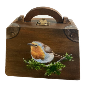 Roodborst koffer verkocht