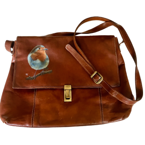 Roodborst tas verkocht